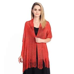 Detail of red metallic glitter shawl with elegant fringe trim for party and evening wear