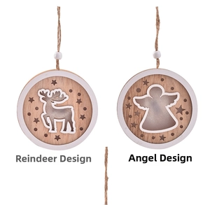 Detail of wooden Christmas pendants featuring reindeer and angel motifs with star cutouts
