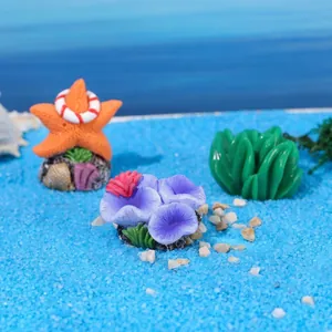 Detailed resin aquarium set with orange starfish, purple anemone, and green coral decor
