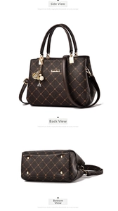 Macro detail of dark brown handbag with monogram pattern and golden hardware accents