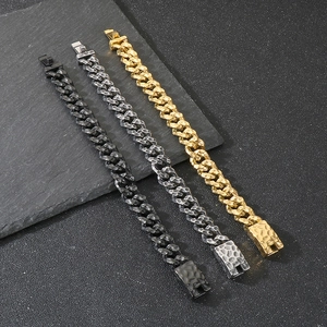 Detailed view of hammered texture on men's vintage stainless steel Cuban link bracelets