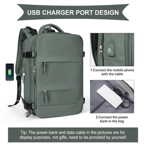 Detail view of large travel backpack showing external USB charging port and buckles