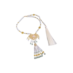 Vintage pearl necklace with golden longevity lock pendant and soft silk tassel