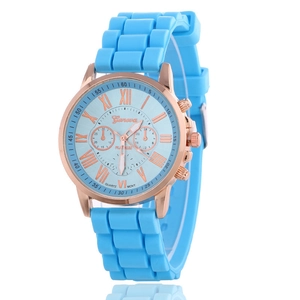 Detailed macro view of Geneva sky blue silicone strap and rose gold quartz watch dial