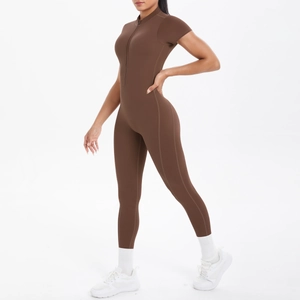 Detail view of coffee brown yoga jumpsuit with front zipper and athletic short sleeves