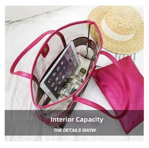 Internal view of a large clear PVC tote bag with magenta trim and matching inner pouch