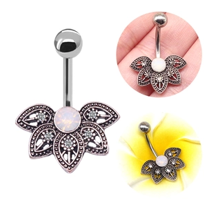 Detailed views of fan-shaped navel ring with white opal and vintage floral hollow design