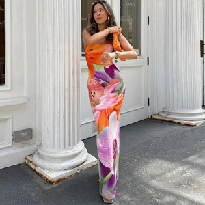 Women's summer backless slit maxi dress with vibrant floral print in tropical style