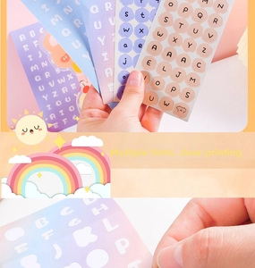 Macro detail of colorful candy-colored alphabet stickers with clear print for DIY journals