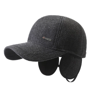 Deep grey wool winter baseball cap with thick ear flaps and stylish sports metal logo detail