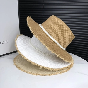 Flat top straw sun hat with pearls and frayed edges for women summer beach style