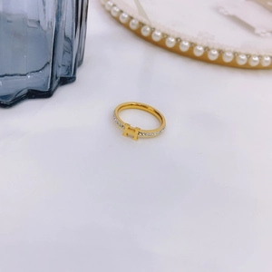 Elegant gold titanium steel ring with H-letter design and pavé cubic zirconia accents