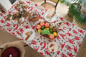 Detailed Christmas table runner with Santa Claus prints on beige cotton linen fabric