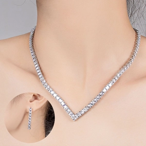 Sparkling V-shaped rhinestone necklace and long earrings jewelry set for women on model
