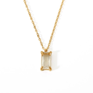 Detailed close-up of a 18K gold stainless steel necklace with a clear zircon pendant