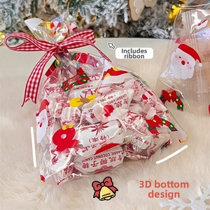 Detail of Christmas gift bag with Santa print and red ribbon for holiday treats