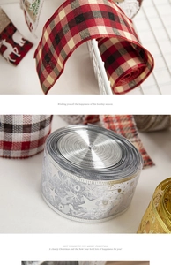 Close-up of red plaid and silver star printed Christmas ribbons for gift wrapping