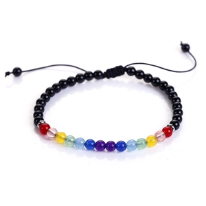 Detailed shot of handmade rainbow bead bracelet with red agate and adjustable black cord