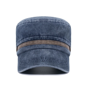 Washed navy cotton cadet cap with vintage texture and brown ribbon detail for outdoors