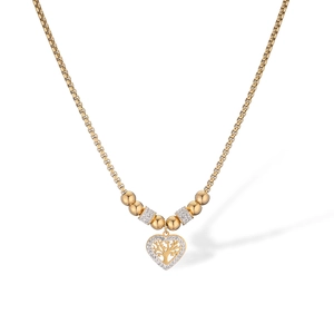 Detail of gold heart pendant with tree of life design and sparkling zircon stones