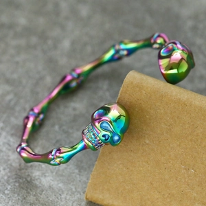 Retro punk style skull bone titanium steel bracelet with colorful iridescent metallic finish