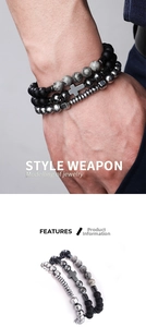 Detailed macro of 3-piece men's beaded bracelet set featuring cross charm and natural stones