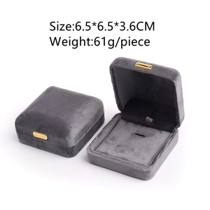 Gray velvet jewelry box for rings, dimensions 6.5x6.5x3.6cm with a gold metal clasp