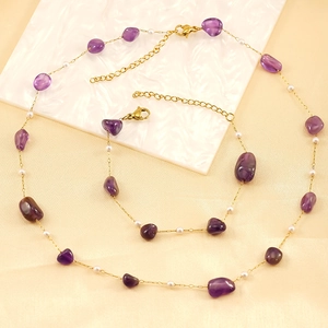 18K gold plated amethyst and pearl jewelry set featuring a necklace and bracelet on silk