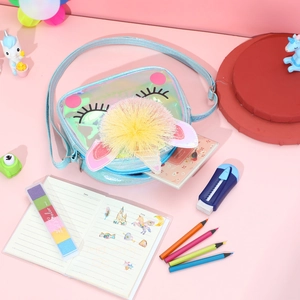 Holographic unicorn crossbody bag for kids with yellow pompom and school stationery