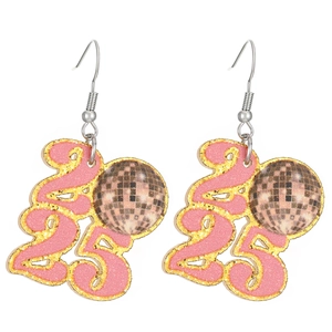 Macro shot of 2025 glitter drop earrings with pink disco ball star details for New Year