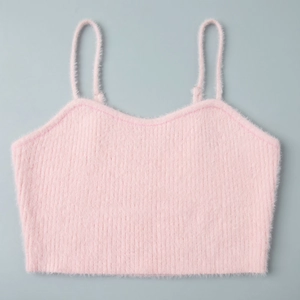 Detail of pink plush knit crop top with soft eyelash yarn texture and ribbed pattern
