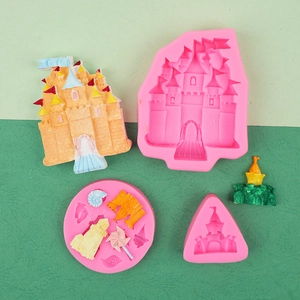 Macro detail of castle and seashell silicone molds with finished fondant cake decorations