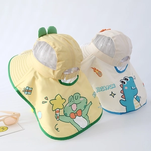 Detail of yellow and beige sun hats for kids featuring wide brims and protective neck flaps
