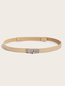 Detail of beige Saffiano leather belt with crystal-encrusted twist lock buckle