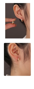 Close-up of 14K gold plated hoop earrings with rectangular cubic zirconia inlay