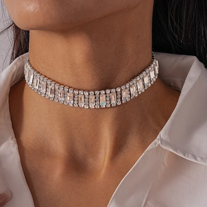 Macro detail of silver geometric crystal choker with sparkling rectangular rhinestones