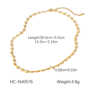 Detailed view of 18K gold plated flower necklace with turquoise centers and dimensions