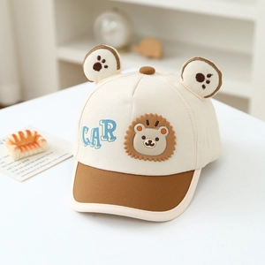 Detailed view of kids baseball cap with cute cartoon lion patch and 3D bear ears