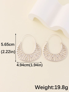 Detailed view of silver hollow cutout earrings with exact size and weight dimensions