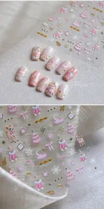 Macro detail of M-776 embossed nail stickers with pink polar bears and snowflakes