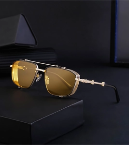Steampunk sunglasses with gold metal frame, amber lenses and mesh side shields