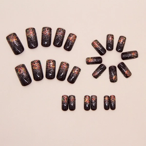 Sparkly black square fake nails with shimmering glitter and star galaxy effect long set