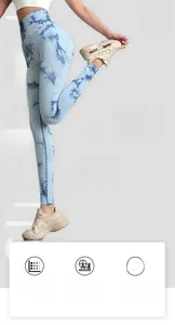 Detailed view of high-waist tie-dye yoga leggings with seamless ribbed texture fabric