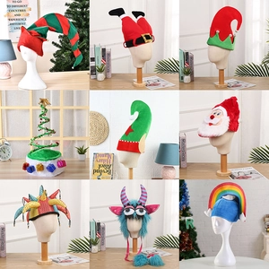 Collection of nine festive Christmas hats featuring elf and Santa styles on display