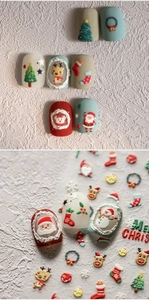 Close-up of festive Christmas nail art stickers featuring Santa, reindeer and snowflakes