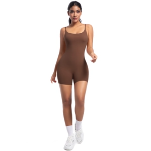 Detail shot of brown compression bodysuit featuring thin spaghetti straps and seamless texture