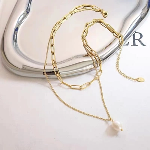 Layered gold titanium necklace with paperclip chain and freshwater pearl pendant