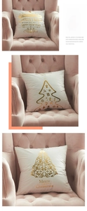 Detail of gold foil Christmas tree patterns on soft cream cushion covers for sofa