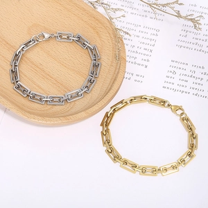 Detailed shot of stainless steel rectangle link chains in silver and gold finishes