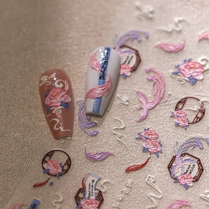 3D embossed nail art stickers with pink peony and phoenix patterns on matte background